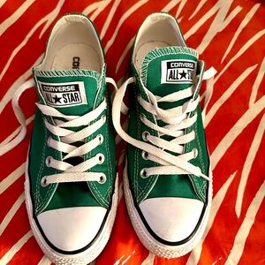 Green Converse All Star sneakers, in good shape.